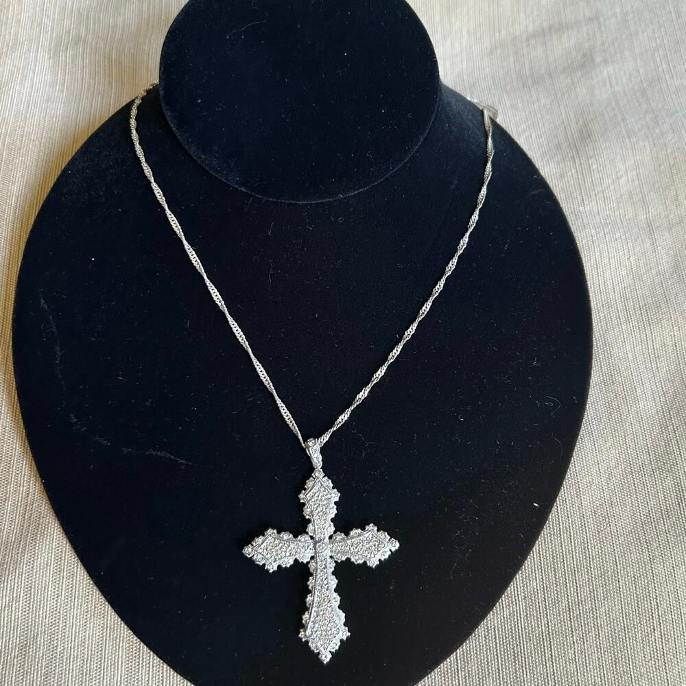 Silver tone rhinestone encrested signed “N” cross pendant necklace